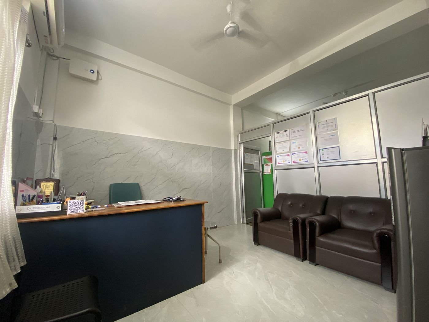 Reception desk and seating area inside Evita GyneCare Clinic